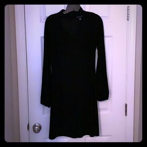 Long sleeve black knee length dress